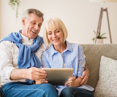 Couple looking at Tablet