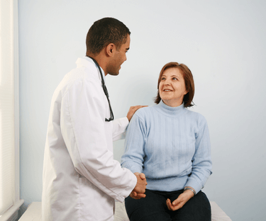 Doctor and Patient - Patient is Sitting Down