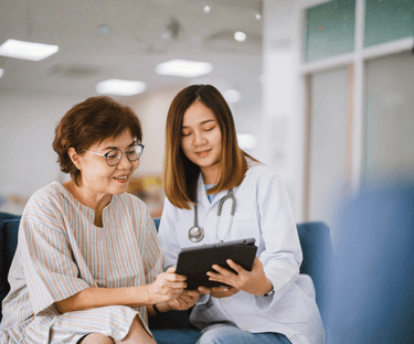 Doctor showing patient something