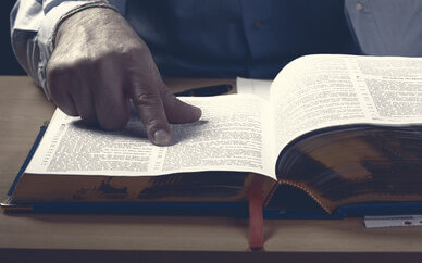 Man reading Dictionary