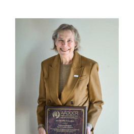 Kathy Hammitt Poses with the 2025 Jack Hein Public Service Award